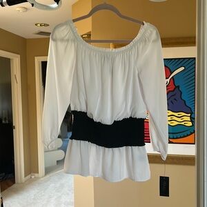 White top with a black cummerbund